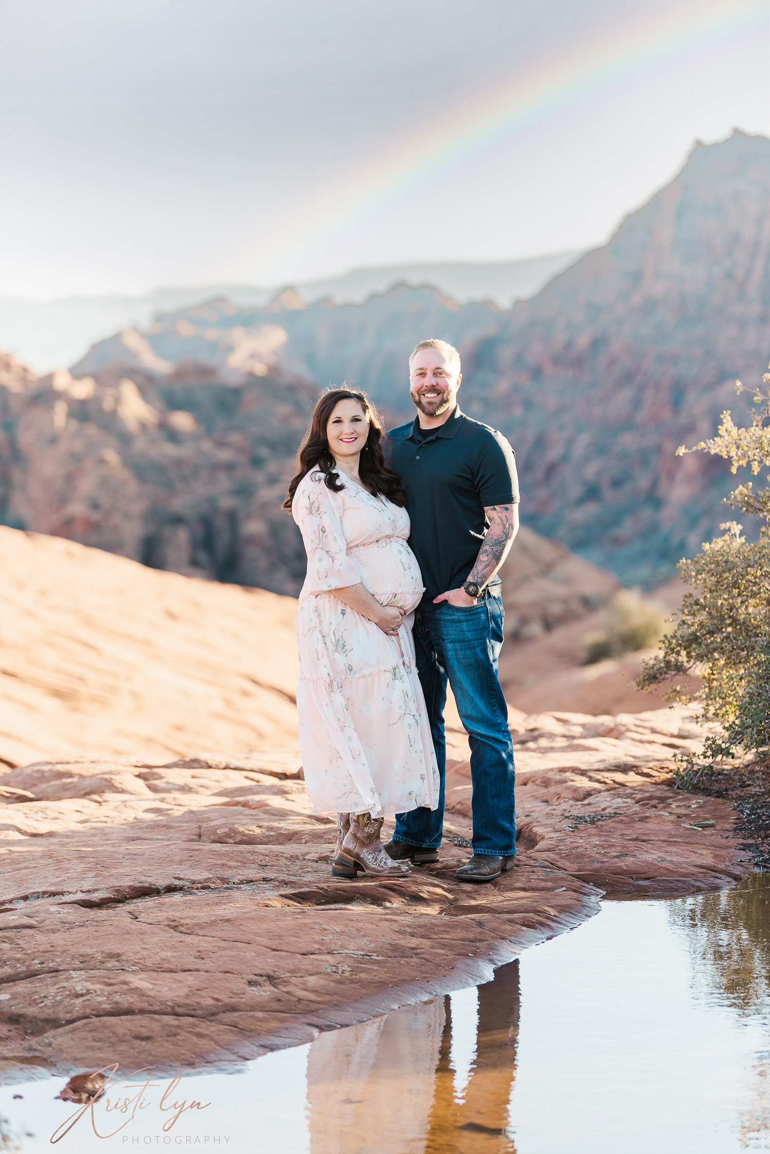 Rainbow over expectant parents during maternity session